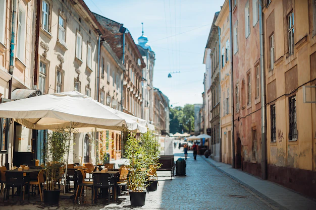 Photo of an old street with cafes